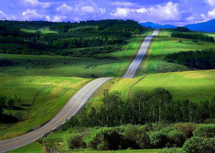 Transition: Long winding road through hillside